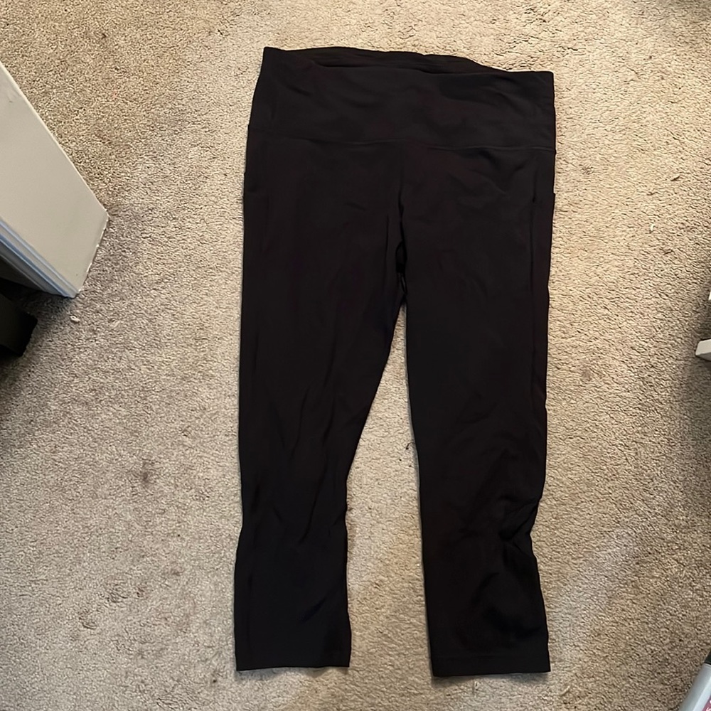 Lululemon, 12, black athletic capris, small hole in seam
